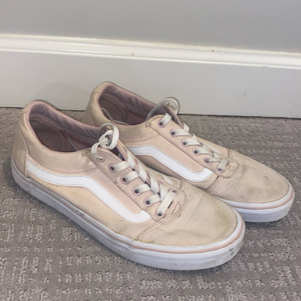 Light pink low top Vans sneakers